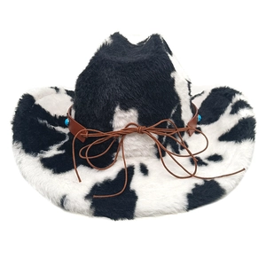 Detail of cow print western hat with vintage turquoise beads and leather trim