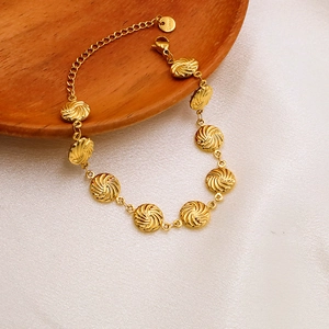 French style gold stainless steel swirl link bracelet with adjustable chain and lobster clasp