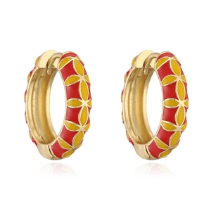 Detail view of red and yellow enamel clover petals on these golden hoop earrings