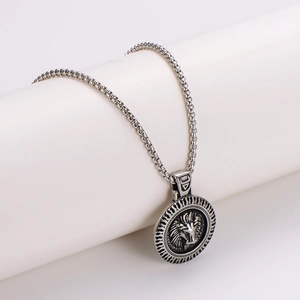 Vintage stainless steel necklace featuring a round lion head pendant on box chain