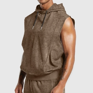 Detail view of men's distressed vintage brown hooded vest with adjustable drawstrings