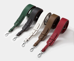 Multiple colors of adjustable cowhide leather shoulder straps with metal spring clips