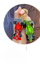 Detailed view of red and green mini racing car keychains with durable metal rings