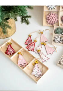 Detailed view of colorful wooden Christmas tree and snowflake ornaments in a storage box
