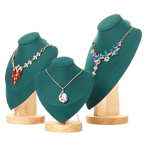 Three-piece dark green velvet and solid wood necklace display bust set for jewelry