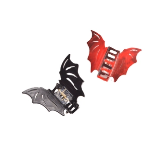 Gothic bat-shaped acetate hair claws in glossy black and red marble patterns