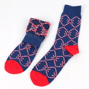 Detail of plush interior texture on heavy knit Christmas socks in navy blue