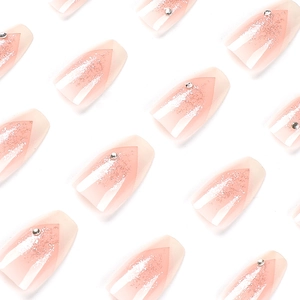 Coffin shaped ombre pink press-on nails with silver glitter and delicate rhinestones