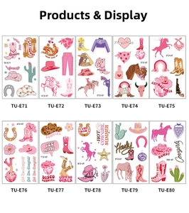 Close-up of pink cowboy temporary tattoos featuring boots hats and cacti designs