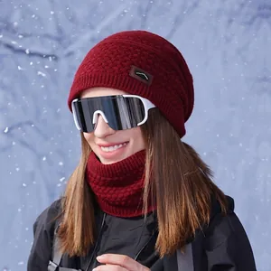 Winter knitted hat and neck gaiter set in burgundy with thick fleece lining for outdoors