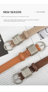 Detail of three slim leather belts for women with round buckles and silver wire accents