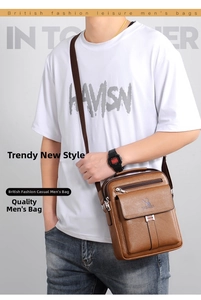 Detailed view of brown leather crossbody bag featuring front flap pocket and brand logo