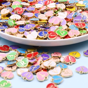 Colorful heart-shaped alphabet pendants with gold plating for DIY jewelry making