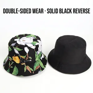Double-sided reversible bucket hat with colorful floral bird print and solid black side