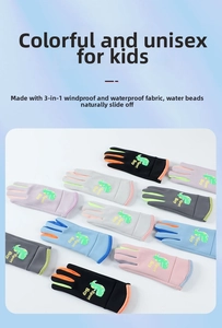 Detail of waterproof kids winter gloves showing hydrophobic surface and cartoon dinosaur