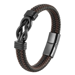 Handmade woven leather bracelet in black and brown with infinity knot and magnetic clasp