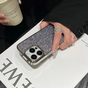 Detail shot of a silver glitter phone case for iPhone 15 Pro with sleek electroplated edges