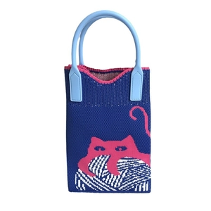 Chic knitted mobile phone bag with a pink cat pattern and contrast blue handles