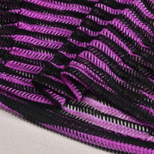Close-up of purple and black striped mesh fabric with detailed knit texture