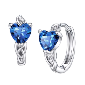 Elegant silver heart earrings with blue gemstone and intricate celtic knot design