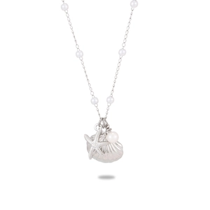 Close-up of silver steel necklace with pearls, starfish and seashell pendant charms