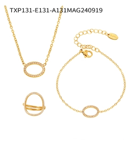 Detail of 18k gold plated stainless steel jewelry set with zircon paved oval rings