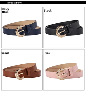 Detail of four colored leather belts featuring sparkling rhinestone gold buckles