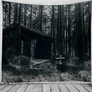 Detail of Gothic forest wall tapestry with stone house and cross on a brick wall