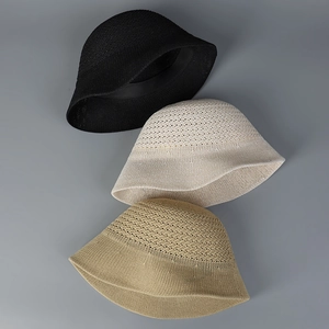 Three hollow knit sun hats in black, cream, and khaki with breathable pattern design