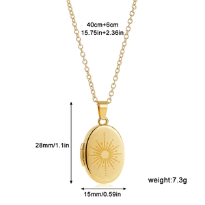 Gold oval stainless steel sunburst locket necklace with size dimensions on white background