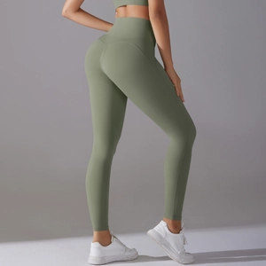 Close-up of olive green high-waist yoga leggings with V-seam for lifting effect
