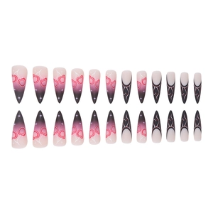 Long stiletto press-on nails with pink to black gradient, cherry and flame patterns