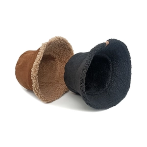 Winter corduroy bucket hat with warm sherpa lining in brown and black colors