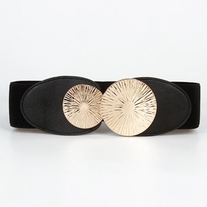 Detail of black elastic belt with dual textured gold circular metal buckles for women