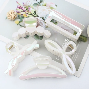 Five pieces of iridescent mermaid white hair claw clips with pearlescent finish