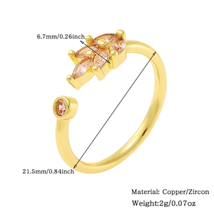 Detail of leaf-shaped gold ring with pink zircon stones and dimension parameters