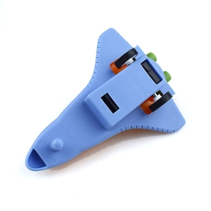 Detail view of a blue space shuttle toy with colorful friction wheels and plastic body