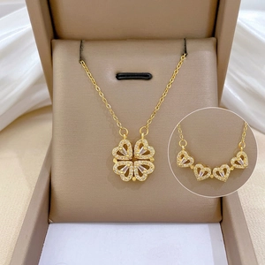 Gold plated stainless steel magnetic clover necklace with cubic zirconia pave settings