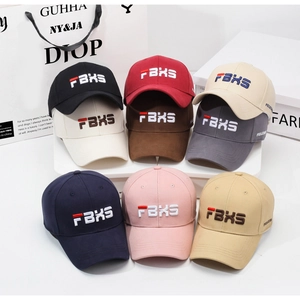 Detailed embroidery view of multi-color baseball caps with FBXS logo and cotton fabric
