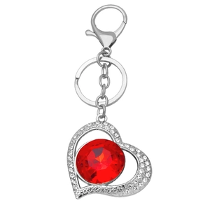 Creative heart keychain with large red crystal and pavé rhinestones in silver finish