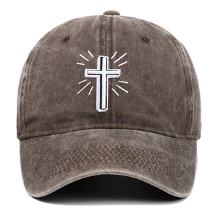 Vintage washed cotton baseball cap featuring white cross embroidery and curved brim