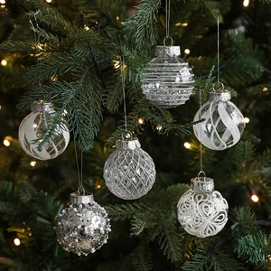 Set of 6 assorted silver and white Christmas tree ball ornaments with glitter and patterns
