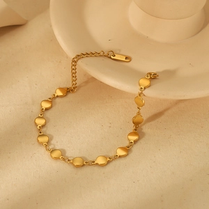 18k gold plated stainless steel bracelet with round disc charms and adjustable lobster clasp