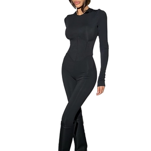 Slim fit black long sleeve bodysuit with high waist design for a sleek silhouette