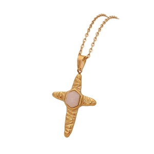 Gold star pendant necklace with pink hexagonal natural stone and hammered metal texture