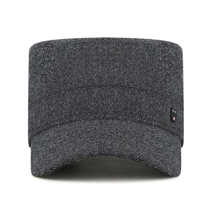 Dark grey winter cadet cap for men with sport emblem and warm knit texture
