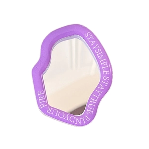 Irregular wavy purple phone mirror holder with Stay Simple Stay True text on white background