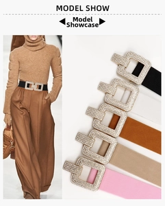 Elastic wide belt with sparkling rhinestone buckle shown in five versatile colors