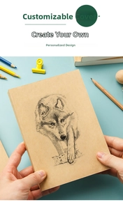 Detail view of a thick kraft paper notebook with a wolf sketch cover, blank pages.