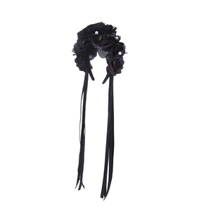 Close-up of black floral headband with white pearls and long hanging black ribbons